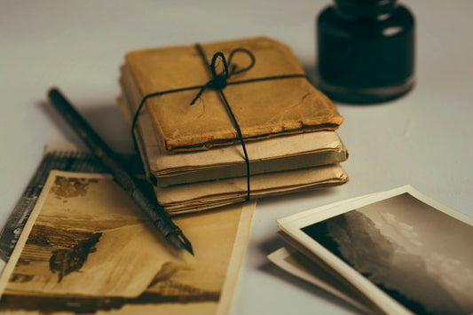 Bundle of handwritten open when letters tied together with twine