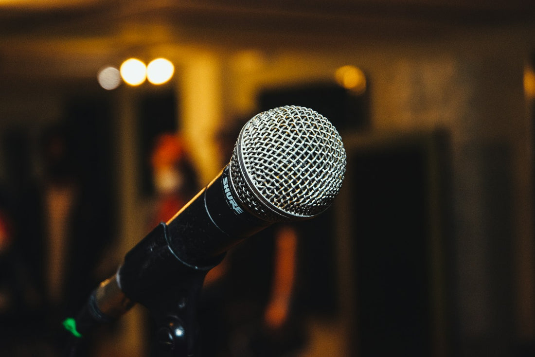 Microphone on a stand ready for the father of the bride speech at a reception